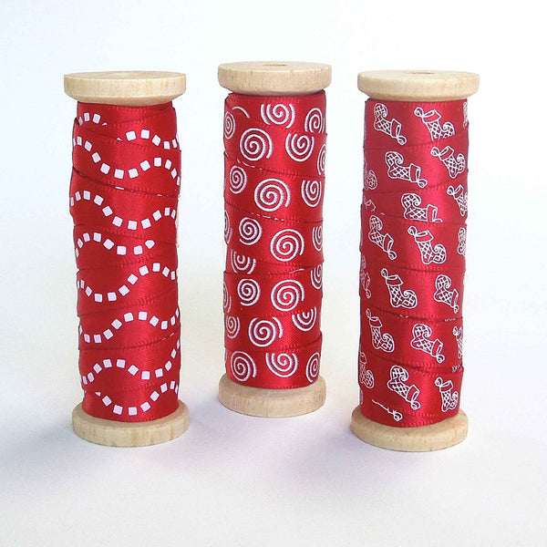 10mm White Swirls on Red Satin Ribbon on Wooden Bobbin - 3 Metres