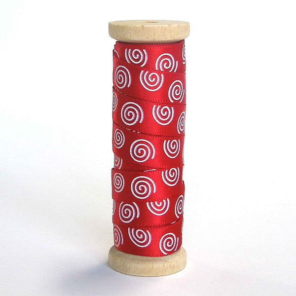 10mm White Swirls on Red Satin Ribbon on Wooden Bobbin - 3 Metres